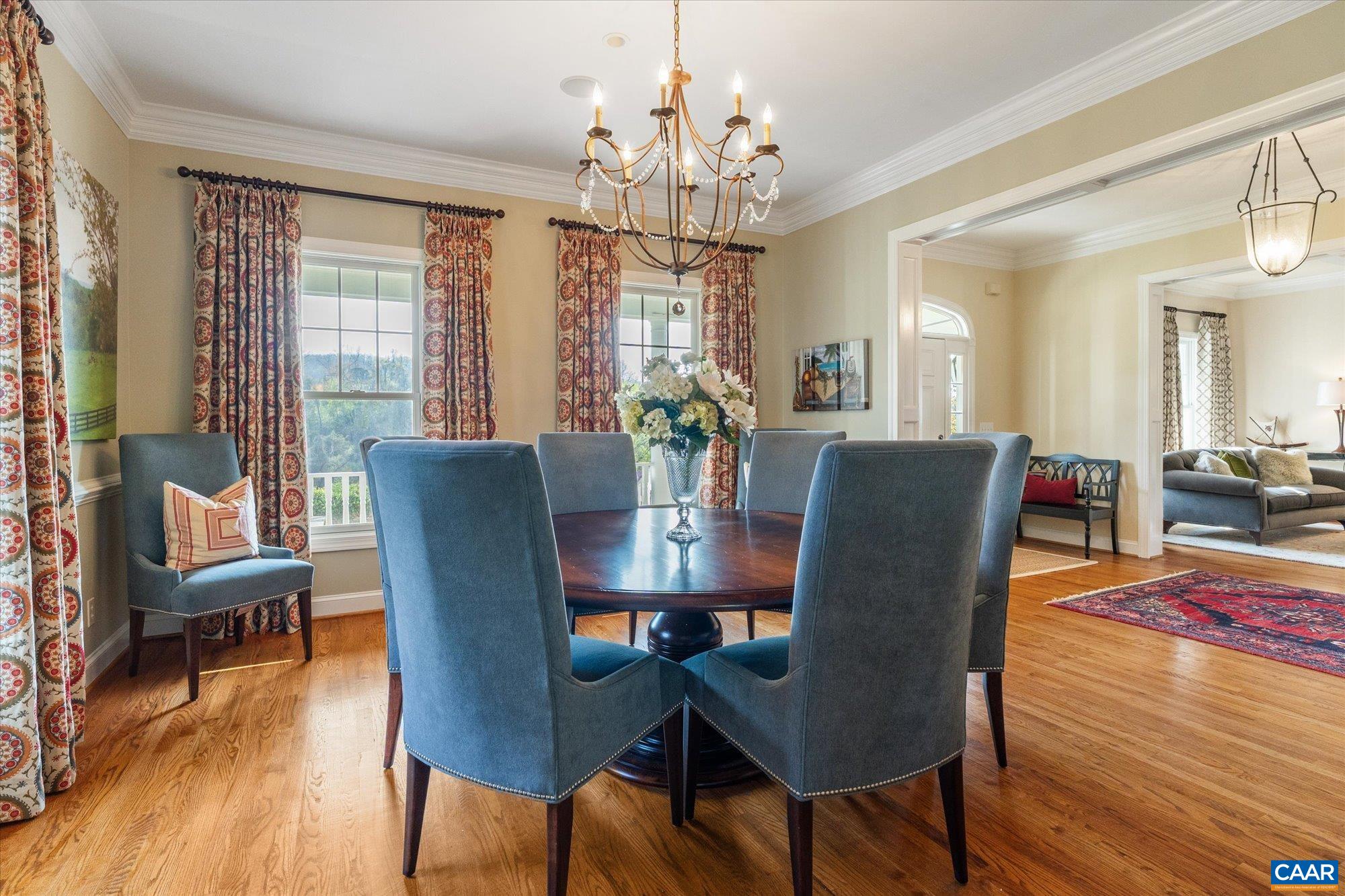 3150 Rocks Farm Court Charlottesville, VA 22903 - Photo 19 of 74 a view of a dining room with furniture wooden floor and chandelier