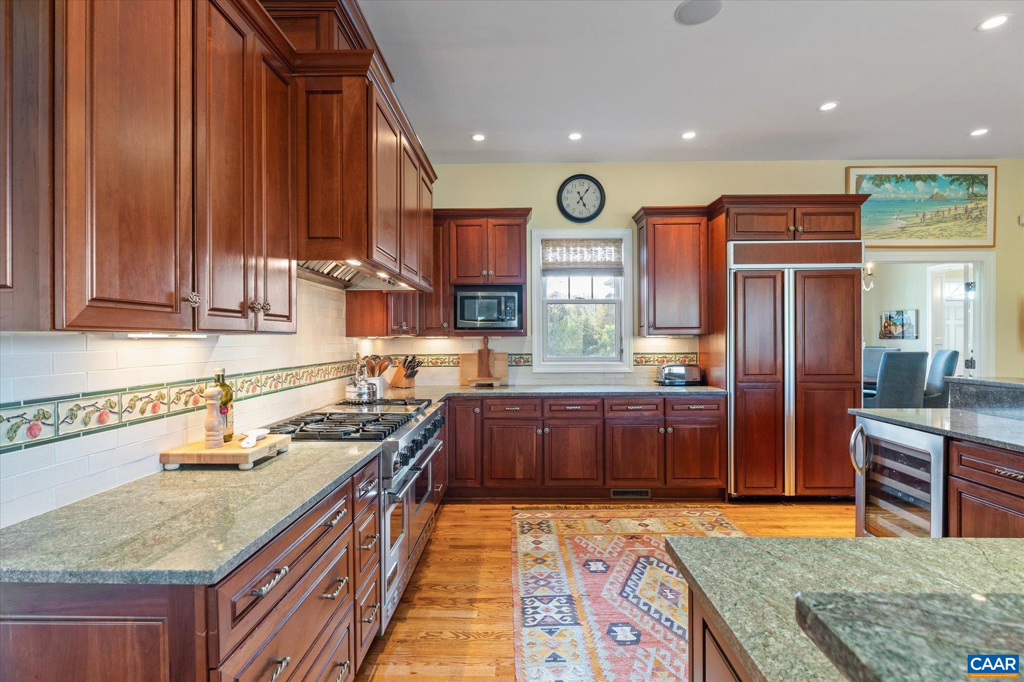 3150 Rocks Farm Court Charlottesville, VA 22903 - Photo 25 of 74 a kitchen with stainless steel appliances granite countertop a sink stove and refrigerator
