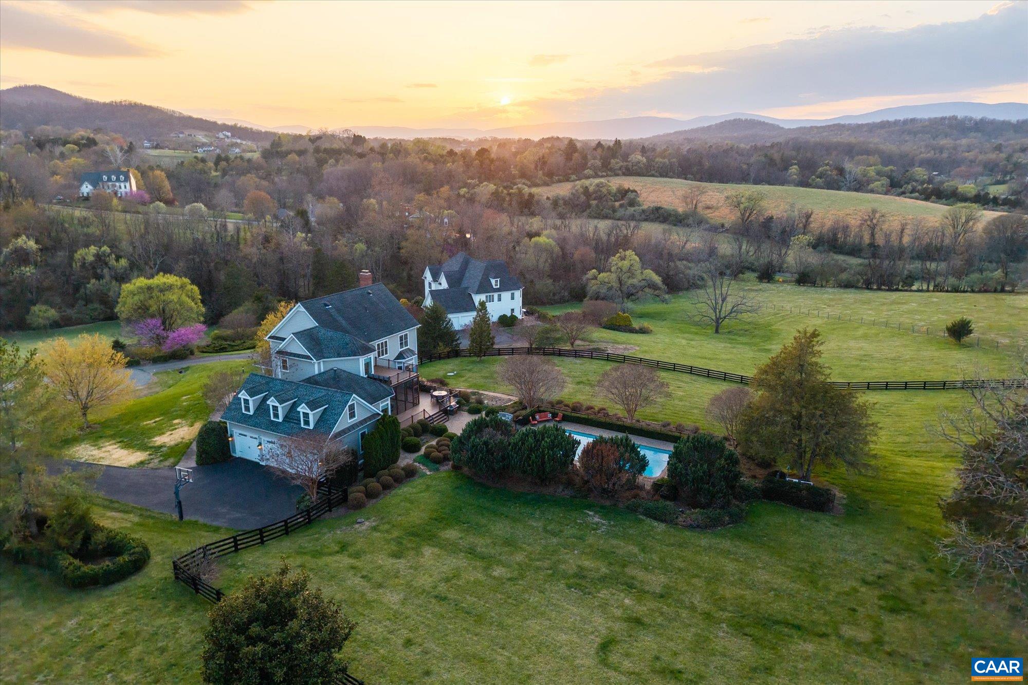 3150 Rocks Farm Court Charlottesville, VA 22903 - Photo 66 of 74 an aerial view of a house with garden space and mountain view in back
