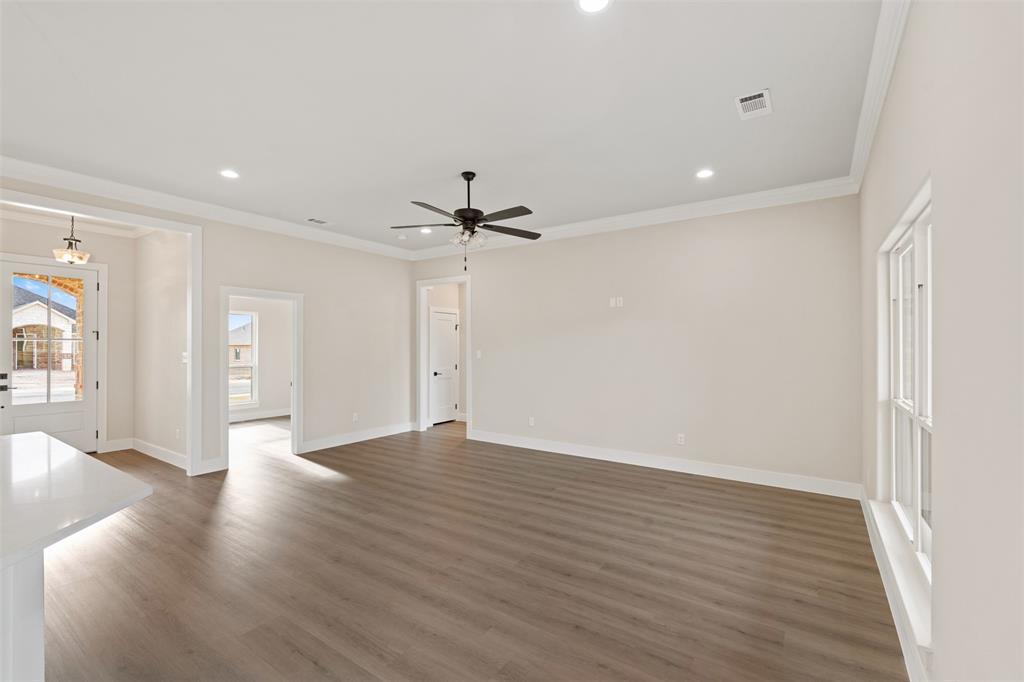 506 Limestone Circle Mabank, TX 75147 - Photo 5 of 33 a view of an empty room with wooden floor