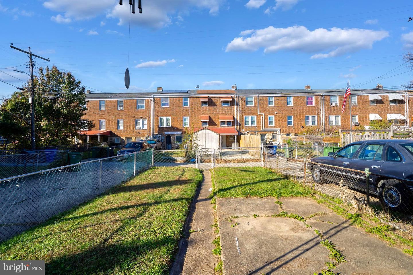 1300 North Potomac Street Baltimore, MD 21213 - Photo 15 of 20 a view of a swimming pool with a patio and a yard