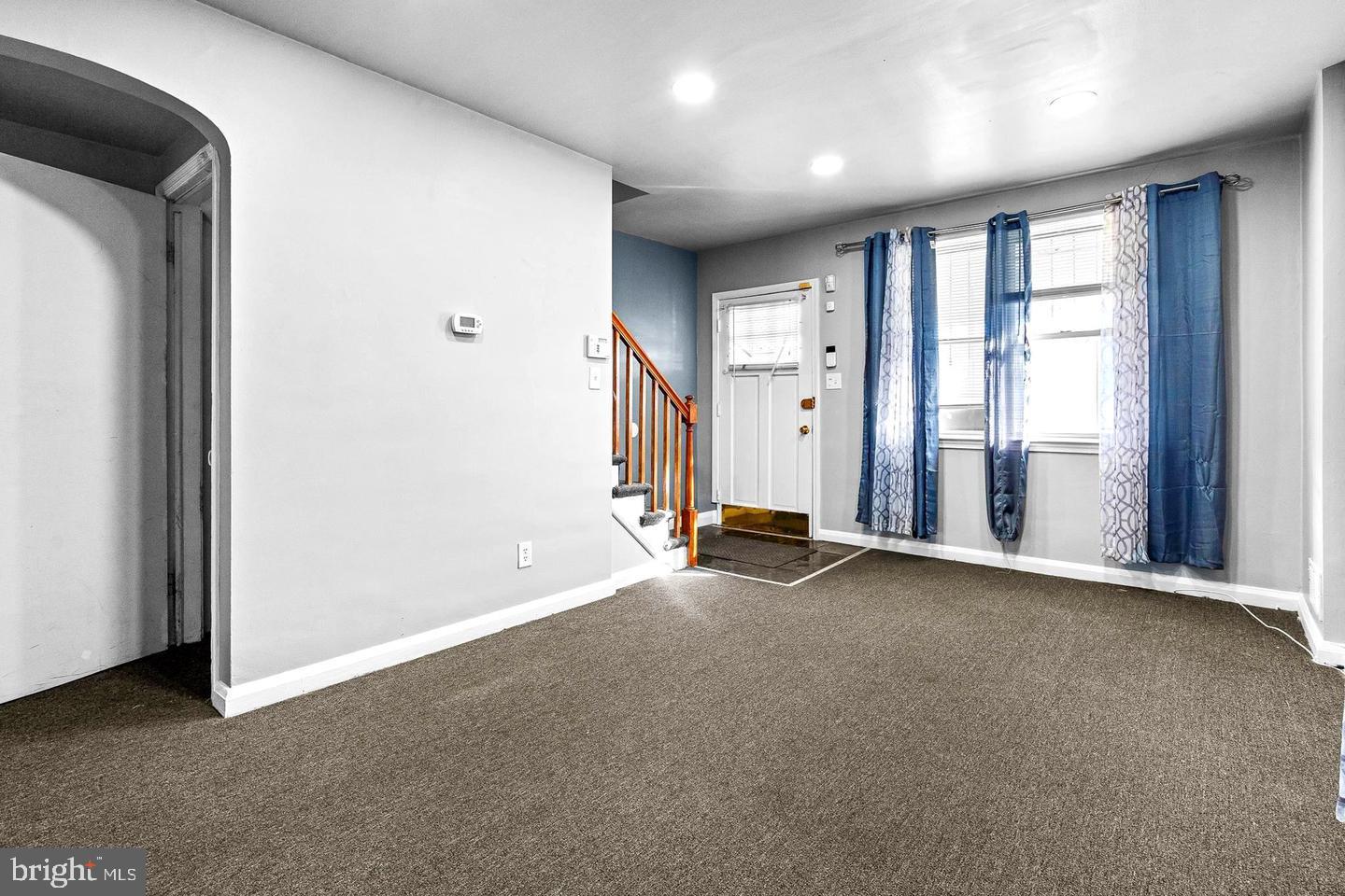 1300 North Potomac Street Baltimore, MD 21213 - Photo 2 of 20 an empty room with windows
