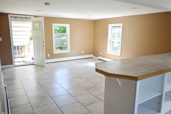 151 Mechanic Street Fitchburg, MA 01420 - Photo 12 of 42 a view of an empty room with a window