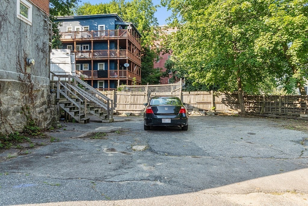 151 Mechanic Street Fitchburg, MA 01420 - Photo 41 of 42 a view of a house with a yard