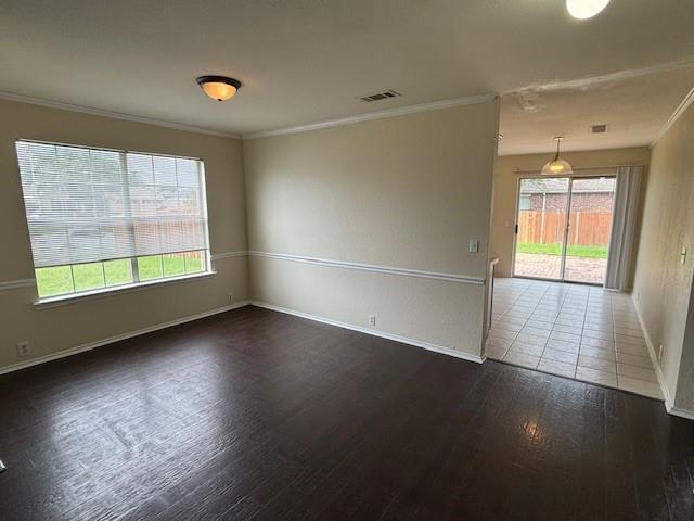 2316 Penton Way Little Elm, TX 75068 - Photo 11 of 22 an empty room with wooden floor and windows