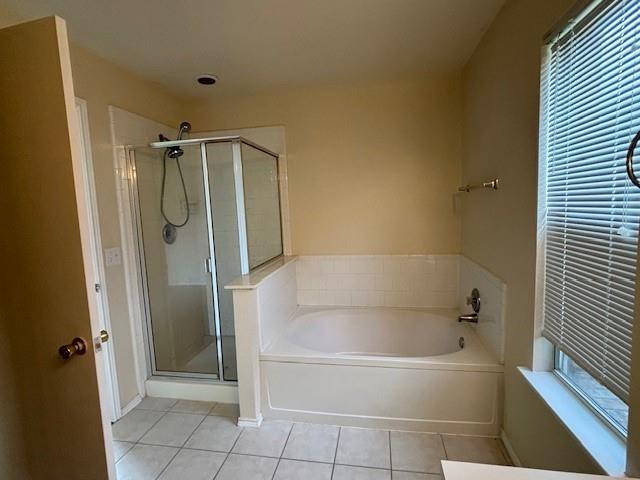 2316 Penton Way Little Elm, TX 75068 - Photo 12 of 22 a bathroom with a bathtub and a shower