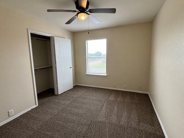 2316 Penton Way Little Elm, TX 75068 - Photo 16 of 22 an empty room with closet and a window