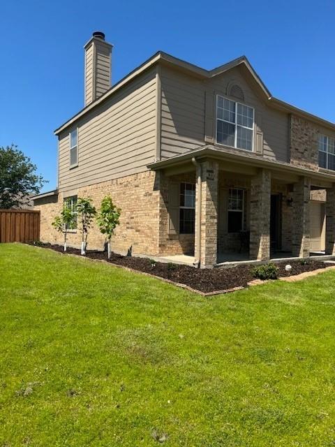 2316 Penton Way Little Elm, TX 75068 - Photo 2 of 22 a view of a house with backyard and garden