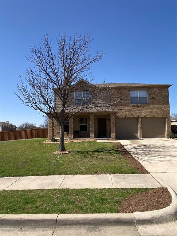 2316 Penton Way Little Elm, TX 75068 - Photo 22 of 22 a front view of a house with a yard and garage