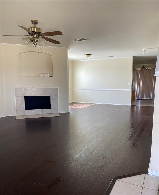 2316 Penton Way Little Elm, TX 75068 - Photo 7 of 22 wooden floor in an empty room with a fireplace