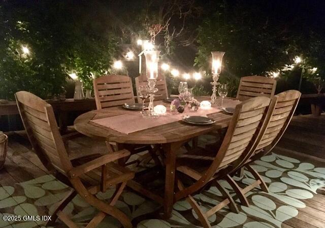 6 Irvine Road Old Greenwich, CT 06870 - Photo 3 of 15 a dinning table and chairs in a patio
