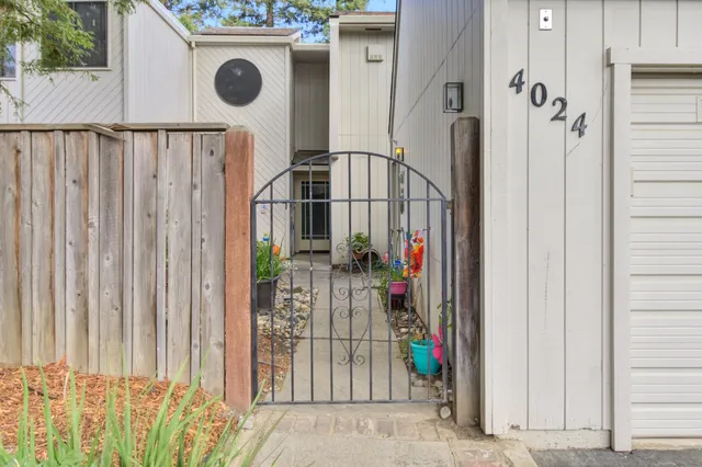 a view of entryway gate of a house