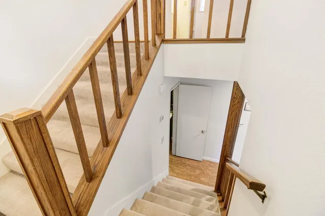a view of a bedroom with windows