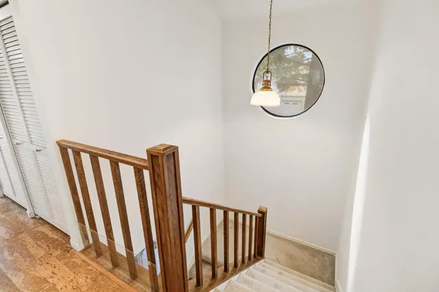 a bathroom with a sink double vanity and a mirror