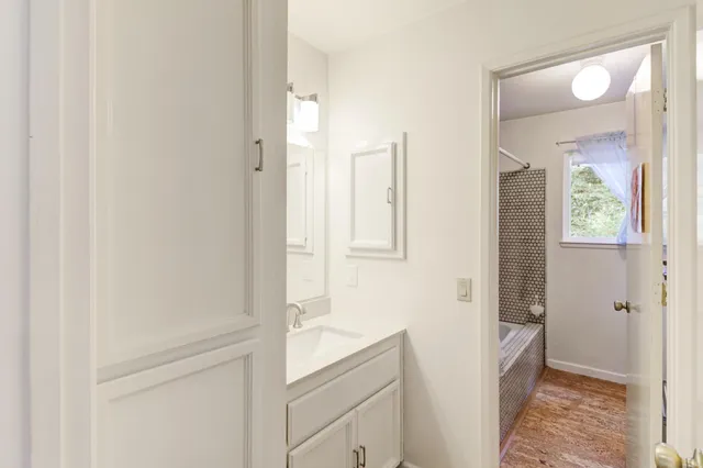 a view of a backyard with pathway