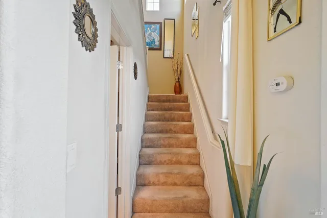 a view of kitchen with cabinets and wooden floor