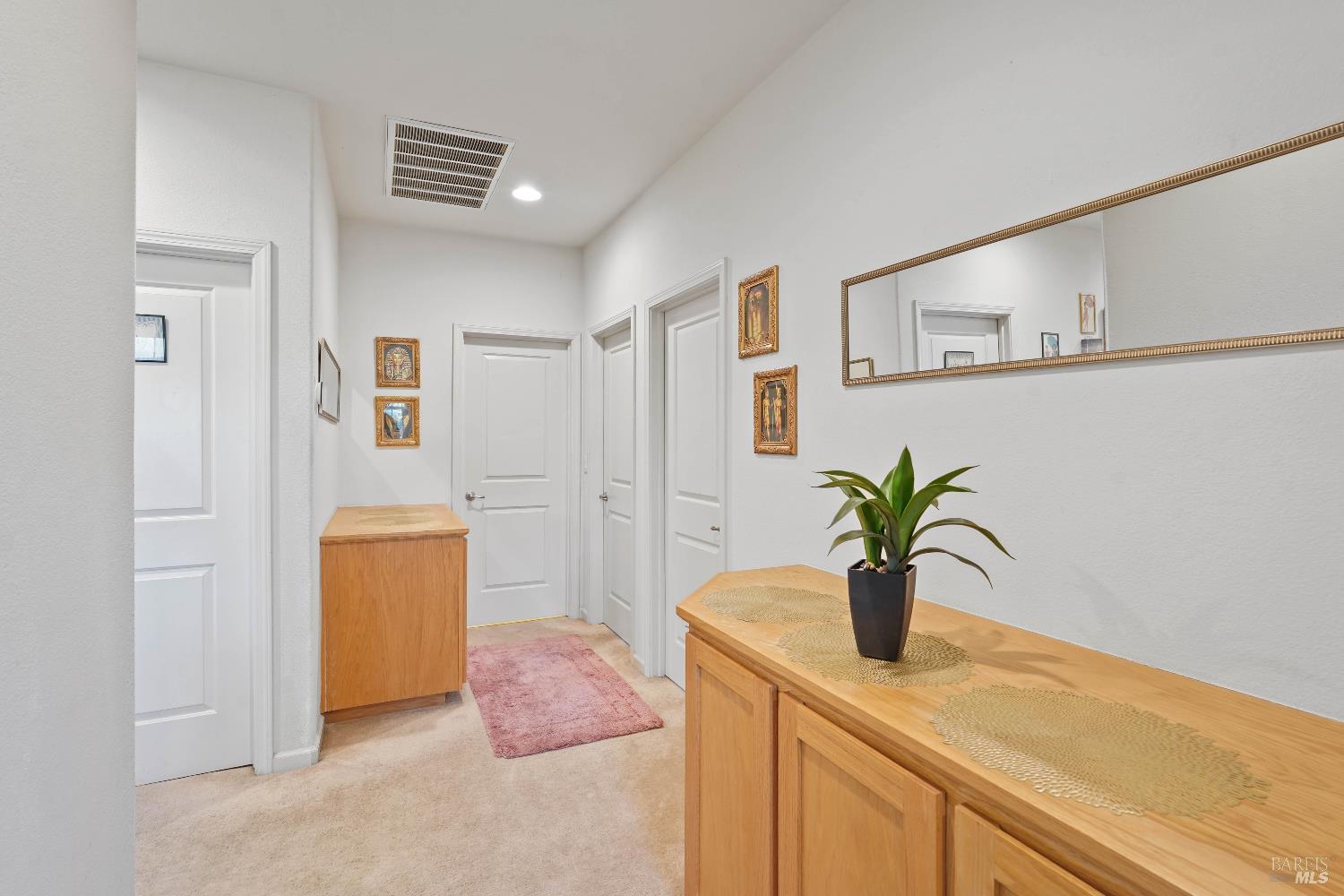 1669 Rutledge Lane Fairfield, CA 94533 - Photo 24 of 49 Upstairs there are 2 linen storage areas. The 2 doors to the right lead to bedrooms. The door to the back is the hall bathroom & the door to the right is the upstairs laundry room
