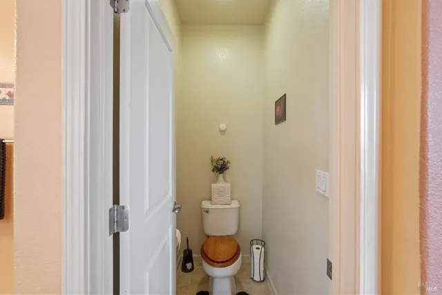 a bathroom with a double vanity sink a mirror and a bathtub