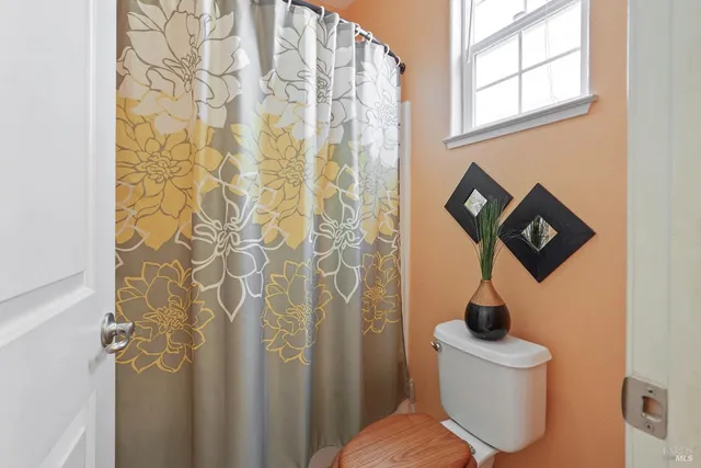 a bathroom with double vanity sinks a vanity and a mirror