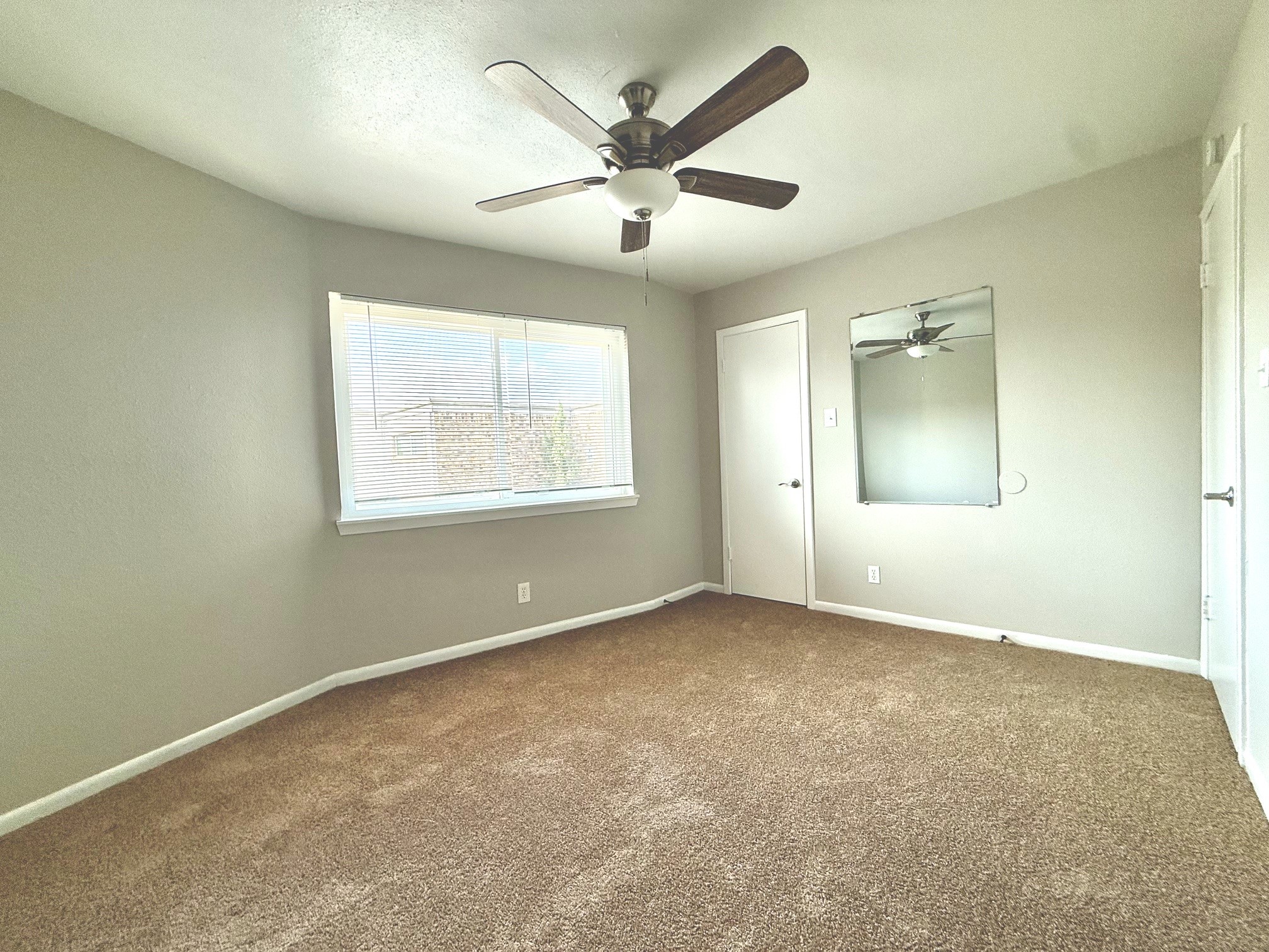 1518 Wirt Road, Unit 6 Houston, TX 77055 - Photo 14 of 14 a view of an empty room with a window
