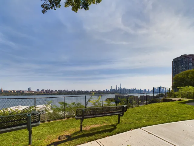 a view of a garden and lake