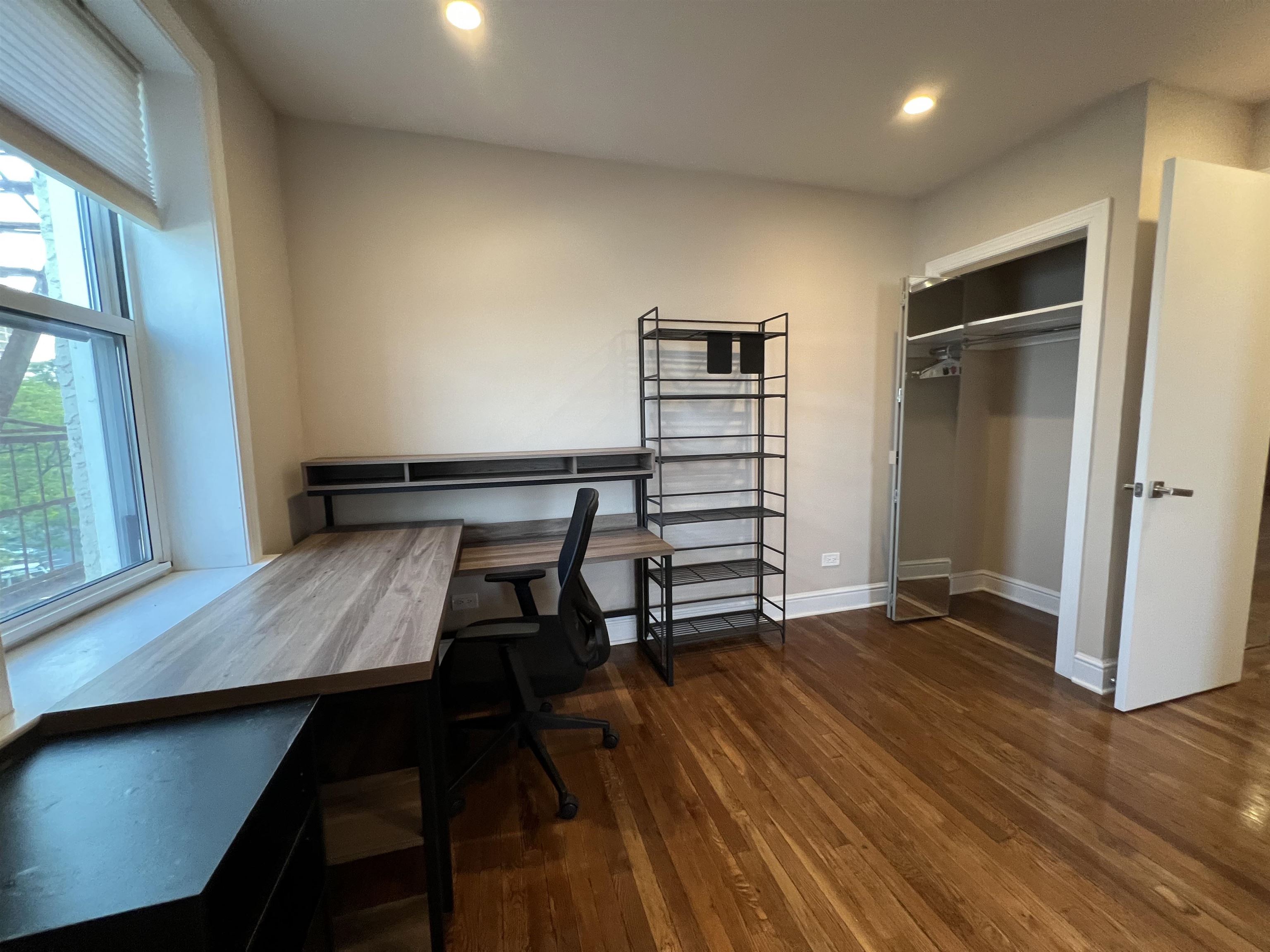 8550 Boulevard East, Unit 3C North Bergen, NJ 07047 - Photo 15 of 25 a view of a room with wooden floor stairs and windows
