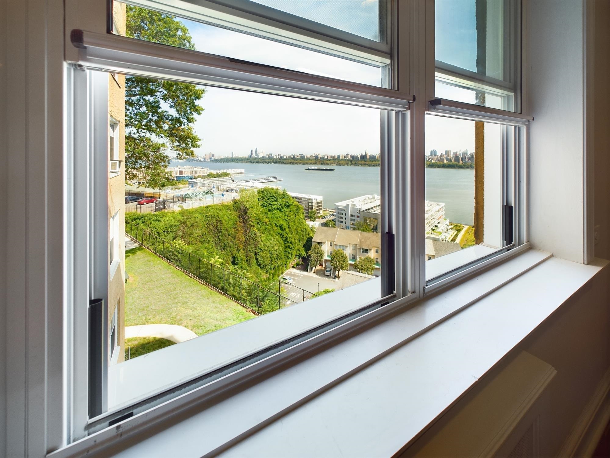 8550 Boulevard East, Unit 3C North Bergen, NJ 07047 - Photo 17 of 25 a view of a glass door with a from a window