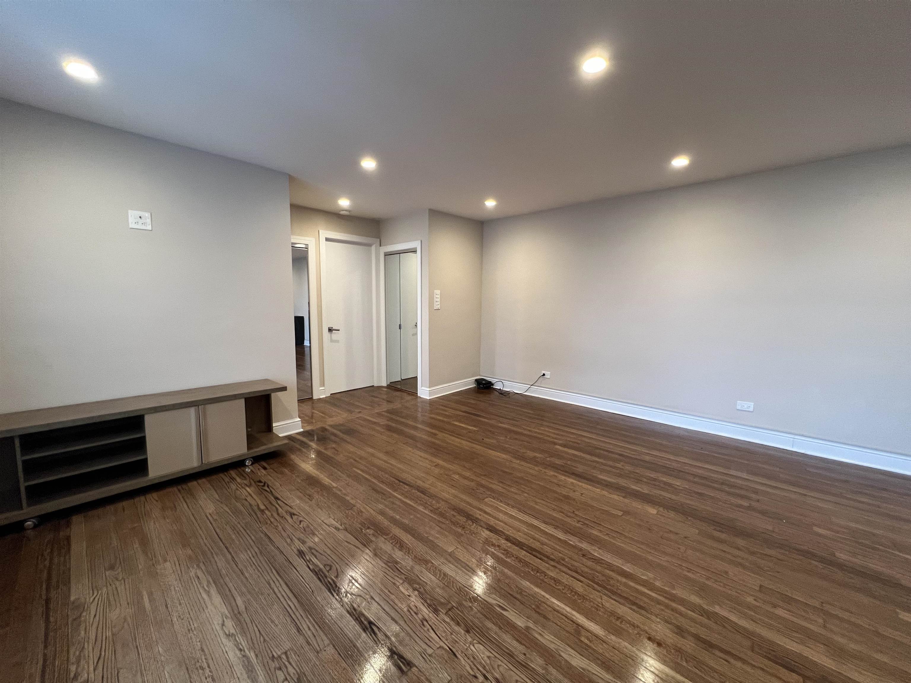 8550 Boulevard East, Unit 3C North Bergen, NJ 07047 - Photo 7 of 25 a view of empty room with wooden floor
