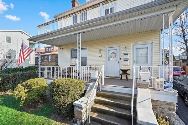 a view of a patio with couches table and chairs