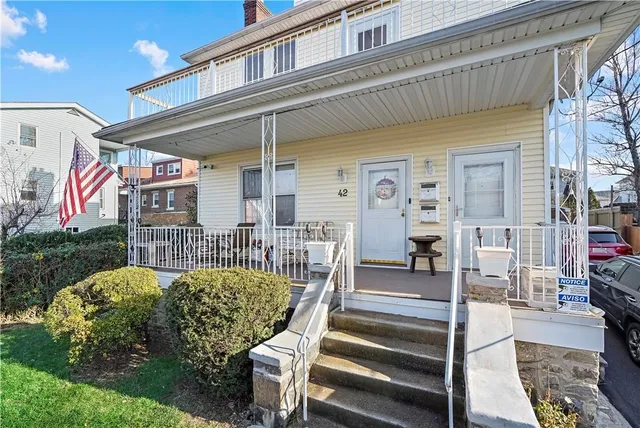 a view of a patio with couches table and chairs