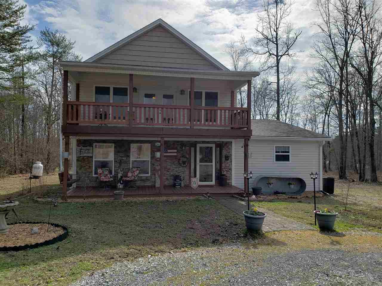 610 Samples Chapel Road Southeast Cleveland, TN 37323 - Photo 1 of 47 a view of a house with backyard and sitting area