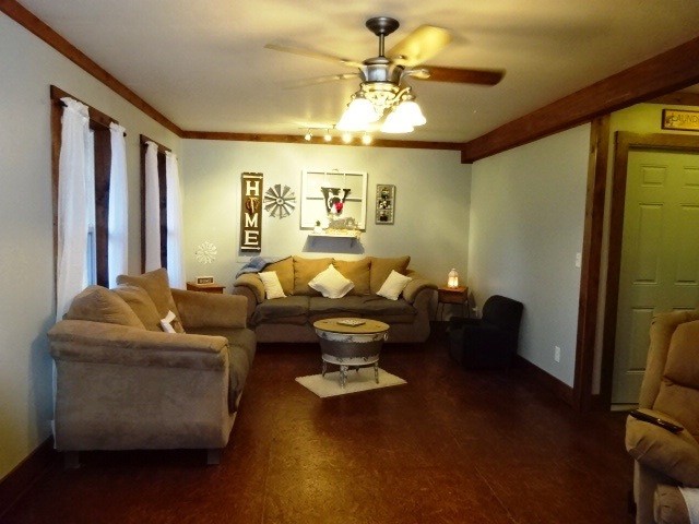 610 Samples Chapel Road Southeast Cleveland, TN 37323 - Photo 3 of 47 a living room with furniture and a chandelier