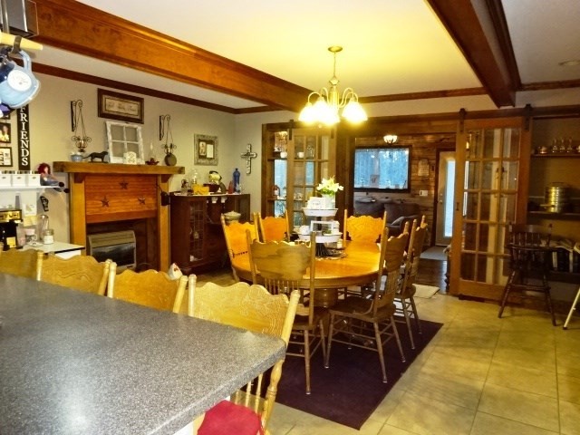610 Samples Chapel Road Southeast Cleveland, TN 37323 - Photo 10 of 47 a view of a dining room with furniture
