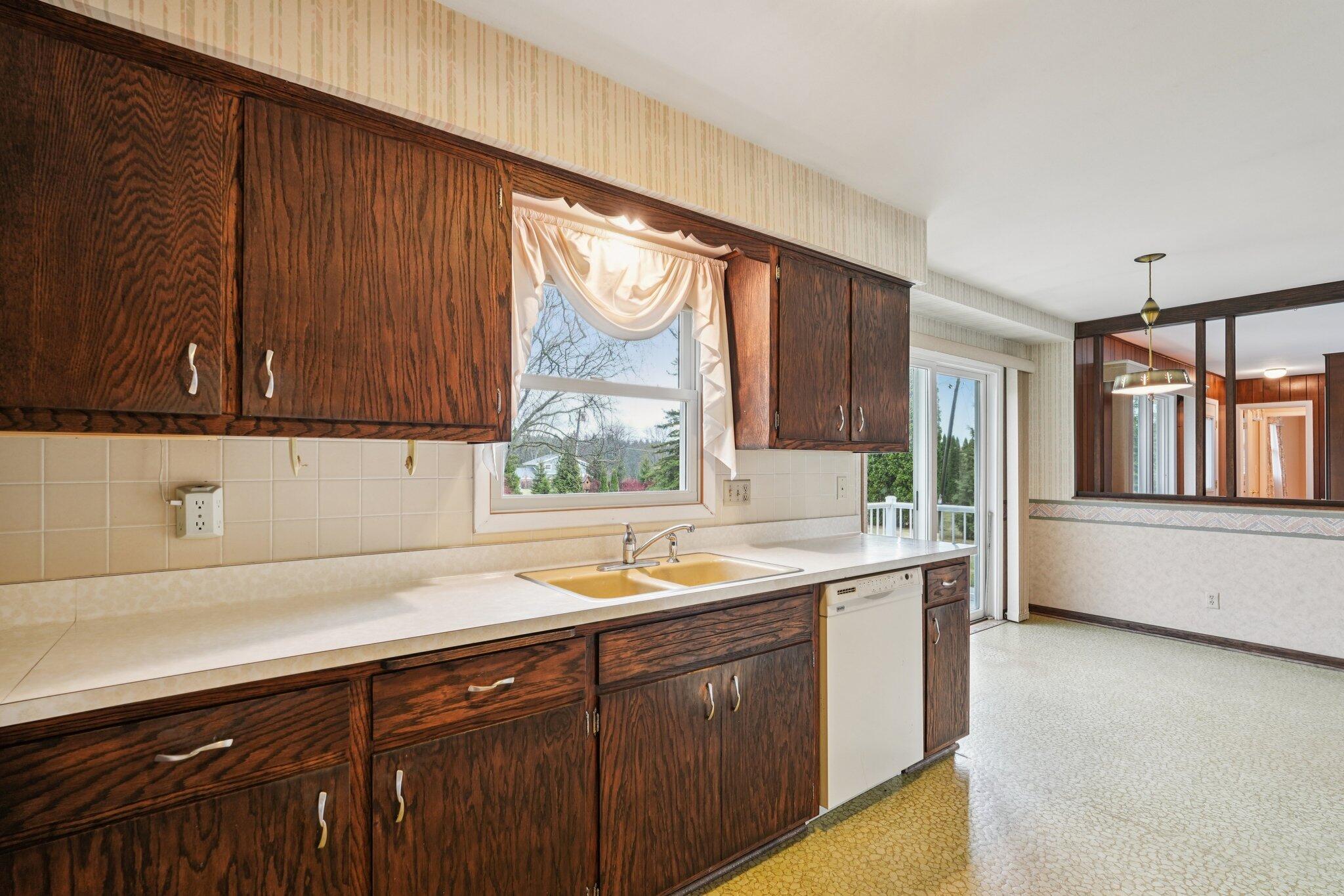 558 Horns Corners Road Cedarburg, WI 53012 - Photo 11 of 23 Window overlooks the pretty backyard