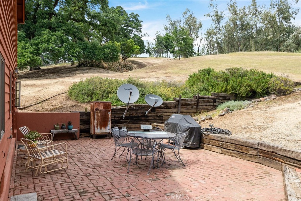 3576 Dry Creek Road Oroville, CA 95965 - Photo 44 of 75 a view of a patio with table and chairs and potted plants
