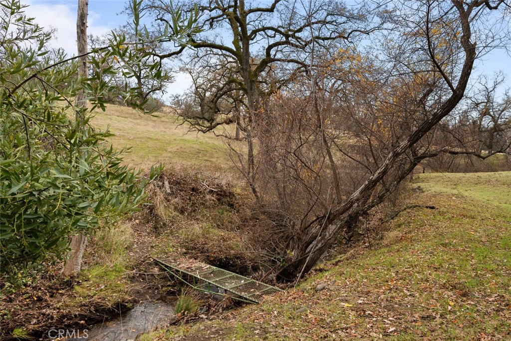 3576 Dry Creek Road Oroville, CA 95965 - Photo 57 of 75 a view of a yard with wooden fence