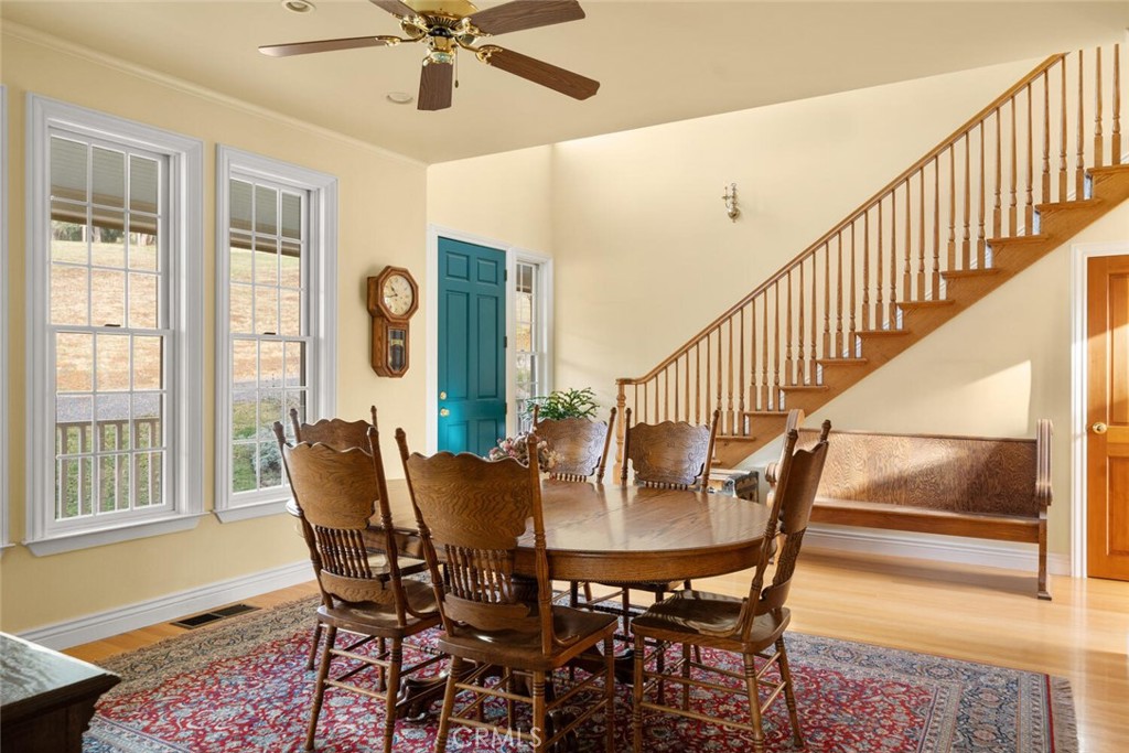 3576 Dry Creek Road Oroville, CA 95965 - Photo 10 of 75 a view of a dining room with furniture window and wooden floor