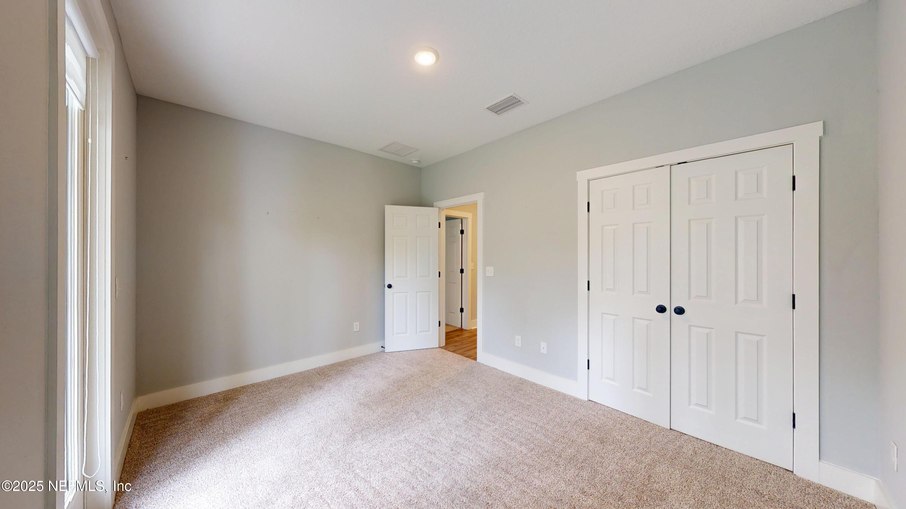 9921 Element Road Jacksonville, FL 32256 - Photo 19 of 37 a view of an empty room