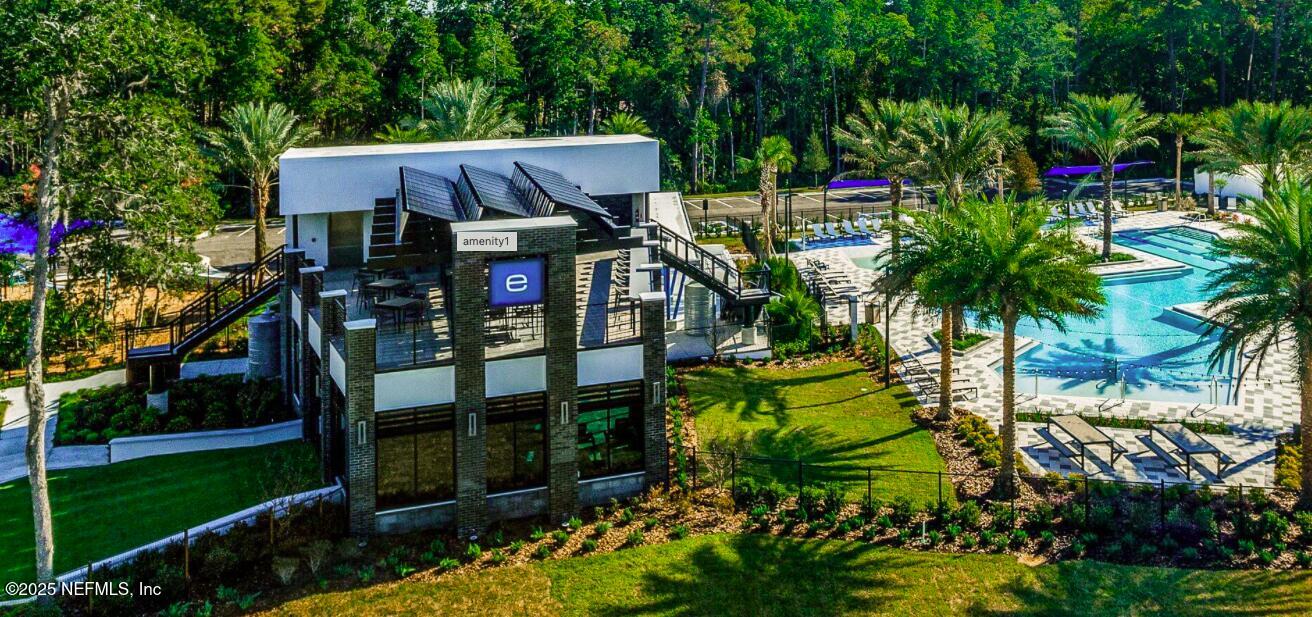 9921 Element Road Jacksonville, FL 32256 - Photo 33 of 37 a view of house with outdoor space and sitting area