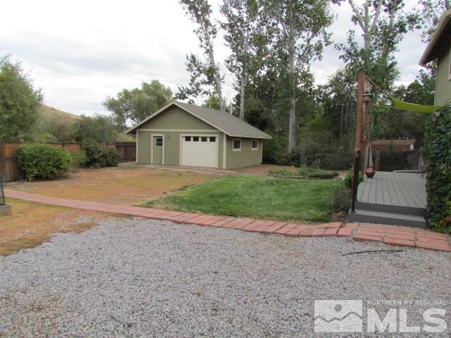 115 Cliff View Drive Reno, NV 89523 - Photo 23 of 25 a view of a house with a yard and large trees