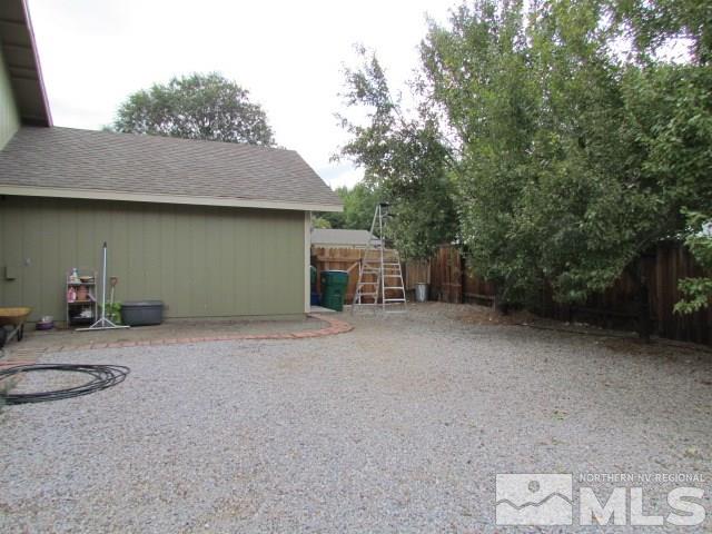 115 Cliff View Drive Reno, NV 89523 - Photo 25 of 25 a backyard of a house with table and chairs
