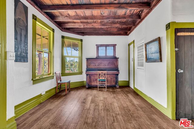 a room with furniture and a window