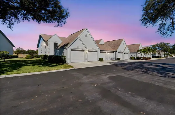 a view of a house with a street
