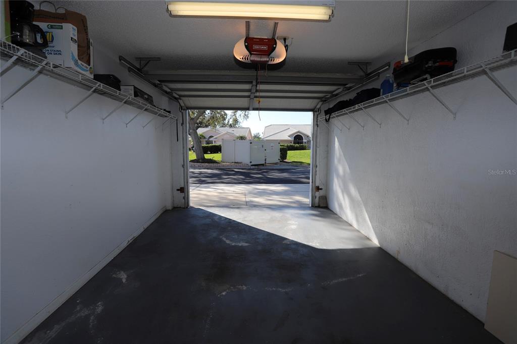 6707 Stone River Road, Unit 101 Bradenton, FL 34203 - Photo 23 of 34 a view of storage and utility room