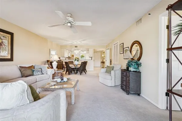 a bedroom with bed and cupboard