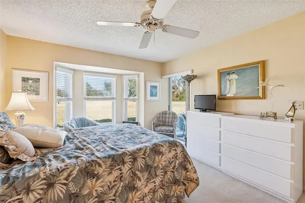 an aerial view of a house with outdoor space