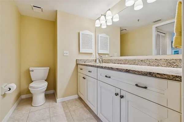 an aerial view of a house with a ocean view