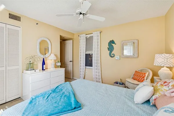 a view of bench sitting in middle of a park