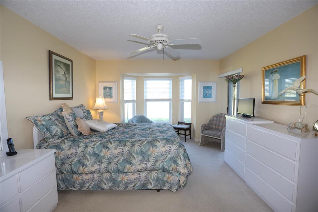 6707 Stone River Road, Unit 101 Bradenton, FL 34203 - Photo 9 of 34 a living room with furniture and a window