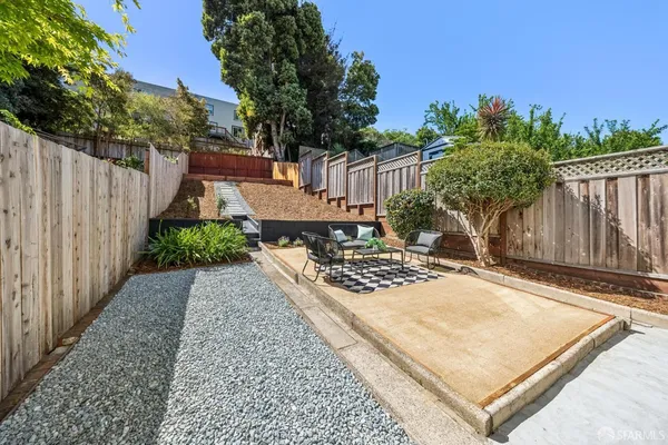 a view of a patio with furniture